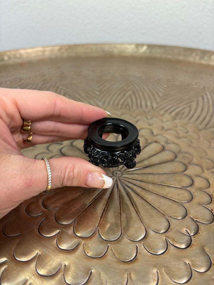 Bolhouder design op pootjes klein met hand.
